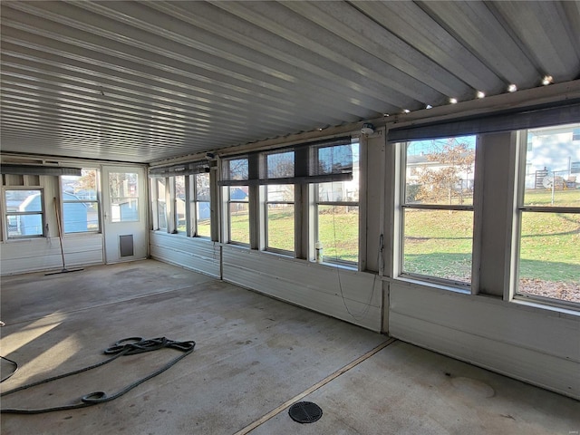 unfurnished sunroom featuring a healthy amount of sunlight