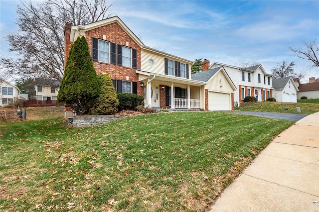 view of front of house with a front yard and a porch