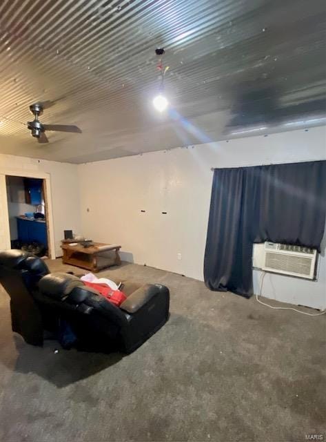 living room with ceiling fan and a wall unit AC