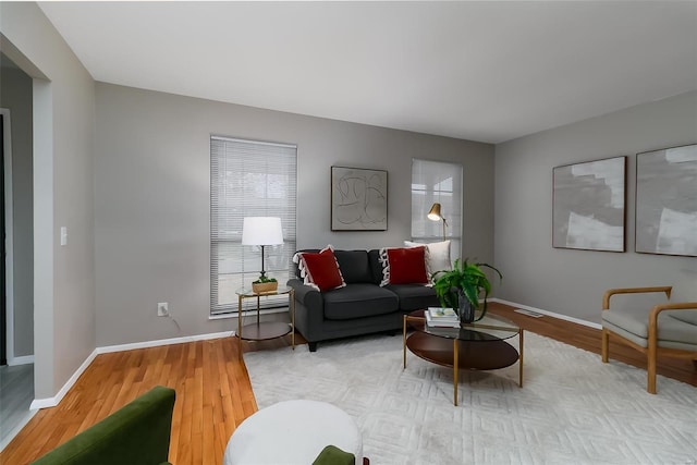 living room with light hardwood / wood-style floors