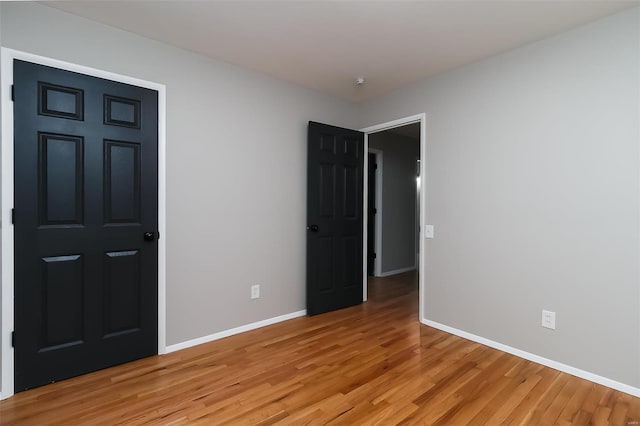 unfurnished bedroom featuring light hardwood / wood-style floors