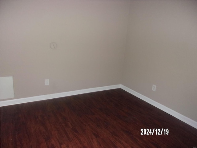 empty room with wood-type flooring