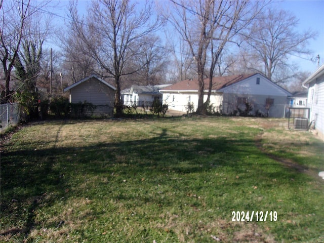 view of yard with central AC