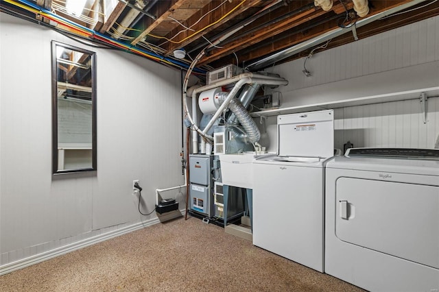 laundry area with laundry area and washing machine and clothes dryer