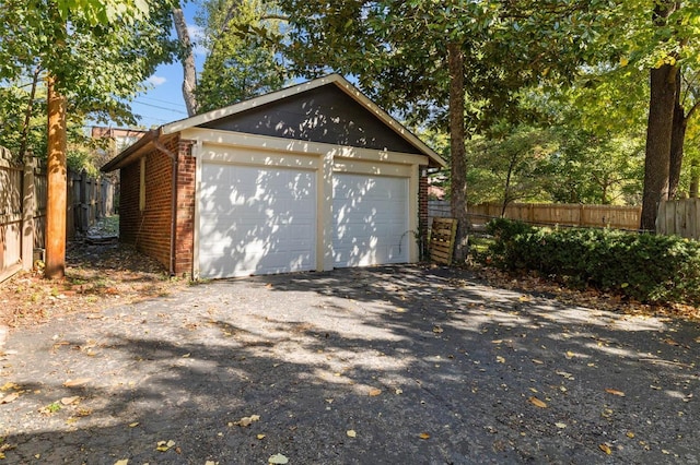 detached garage with fence