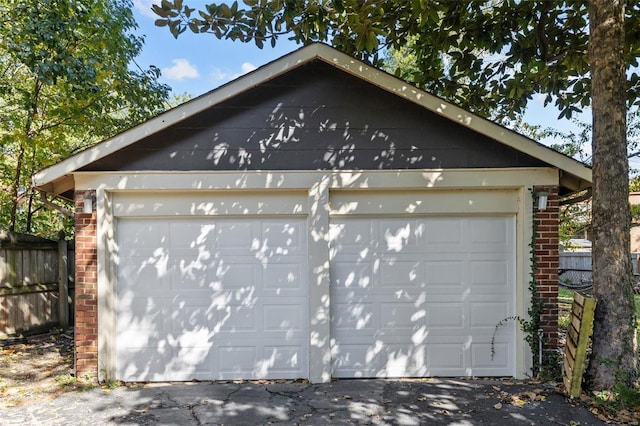 detached garage with fence