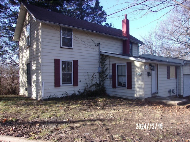 exterior space with a garage