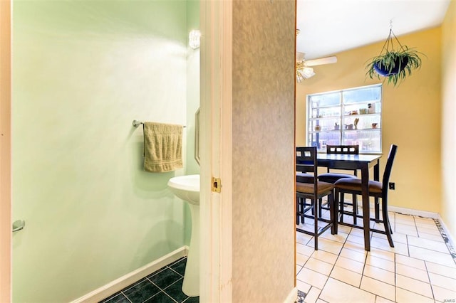 bathroom with tile patterned floors