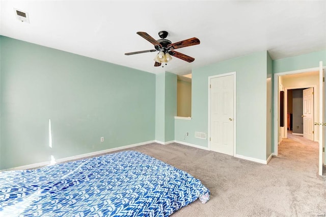 carpeted bedroom with ceiling fan