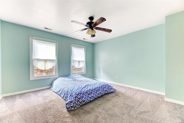 bedroom featuring carpet flooring and ceiling fan