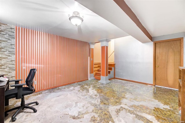 unfurnished office with concrete flooring