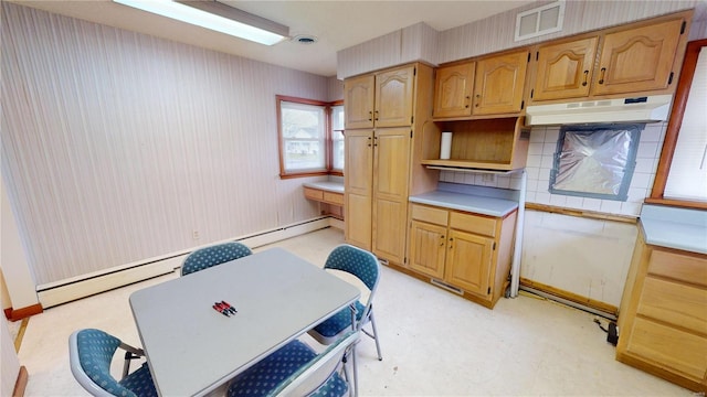 kitchen with a baseboard heating unit