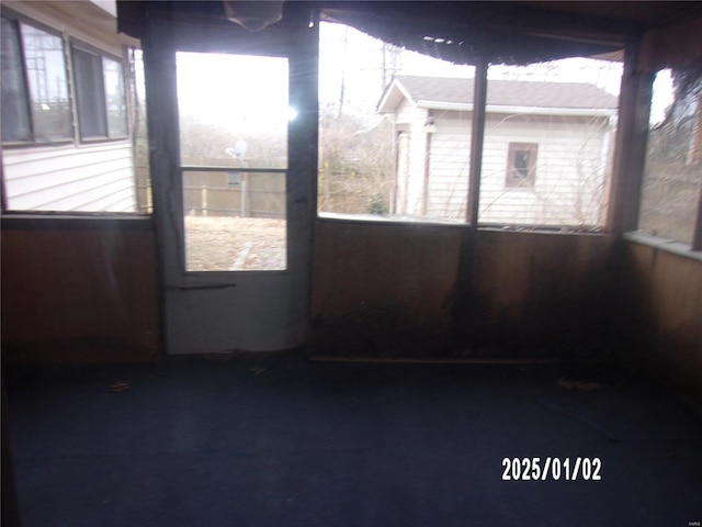 view of unfurnished sunroom