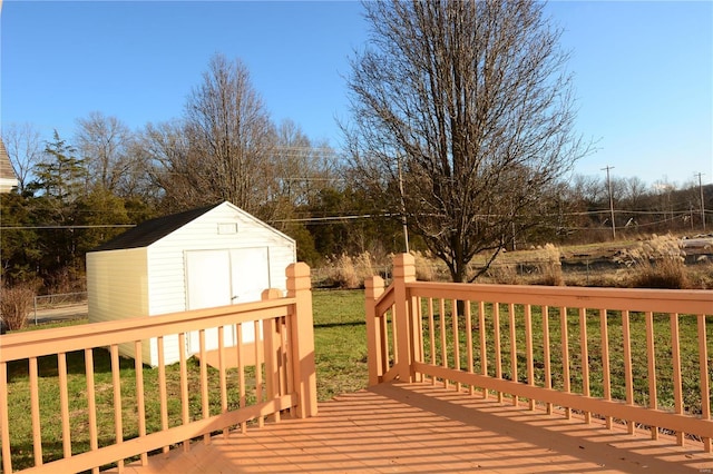 wooden deck with a storage shed