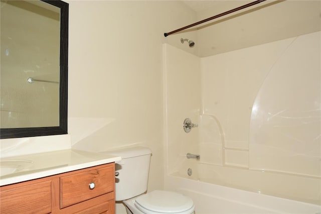 full bathroom featuring shower / washtub combination, vanity, and toilet