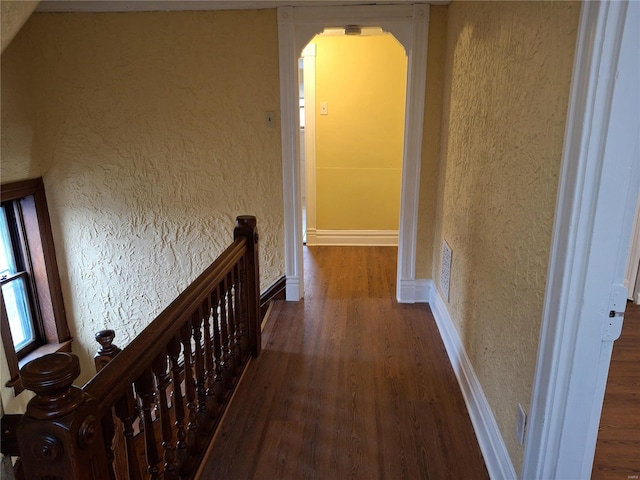 hall featuring dark hardwood / wood-style floors