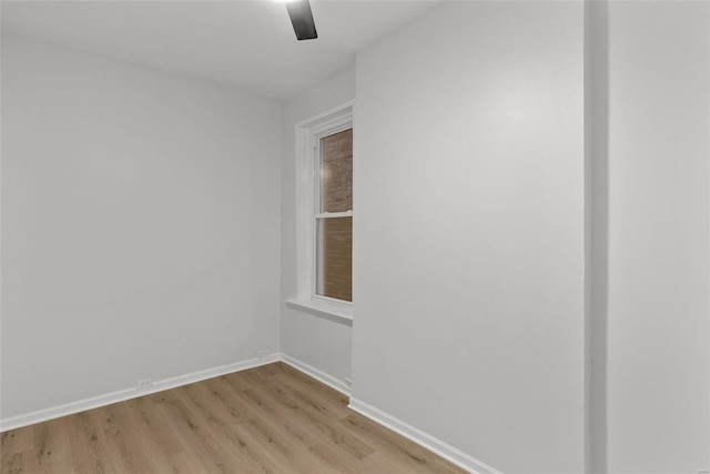 unfurnished room with light hardwood / wood-style floors