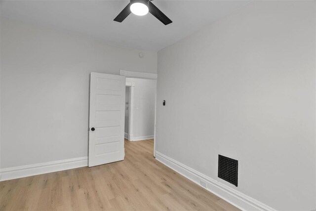 unfurnished room featuring ceiling fan and light wood-type flooring