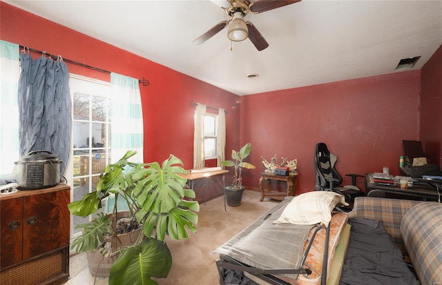 bedroom with ceiling fan and carpet floors