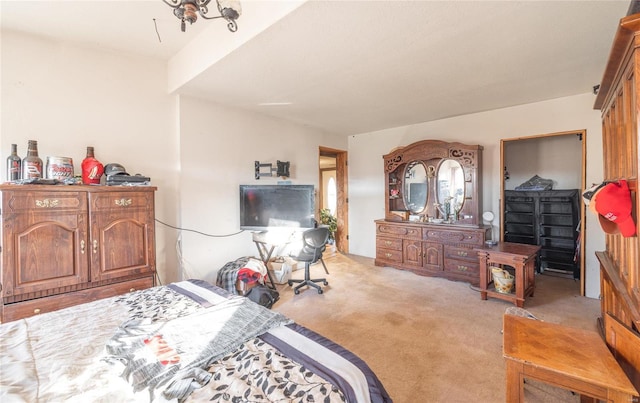 bedroom featuring light carpet