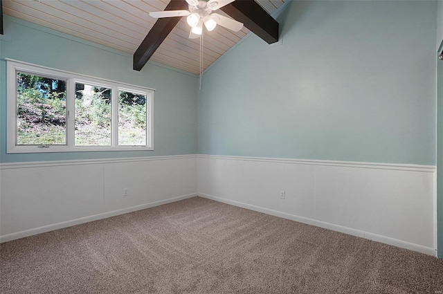 carpeted spare room with wood ceiling, ceiling fan, and lofted ceiling with beams