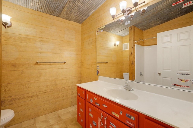 bathroom featuring wooden walls, a shower, and toilet