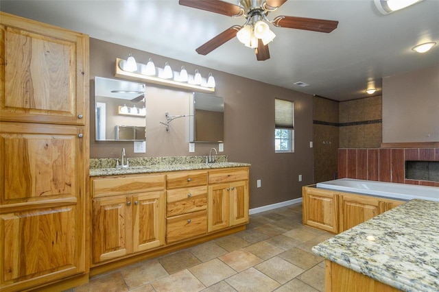 bathroom with ceiling fan, shower with separate bathtub, and vanity