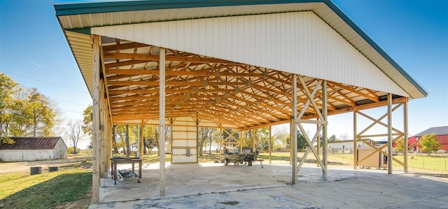 view of community featuring an outdoor structure