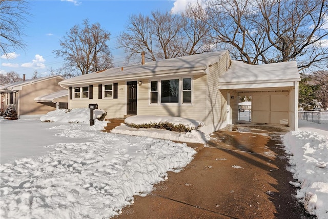 view of front of property with a carport