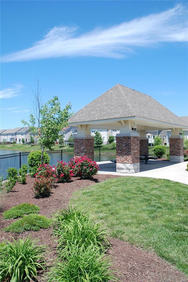 exterior space featuring a gazebo and a lawn