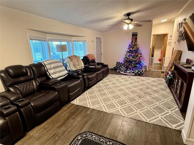 living room featuring crown molding, ceiling fan, and hardwood / wood-style flooring