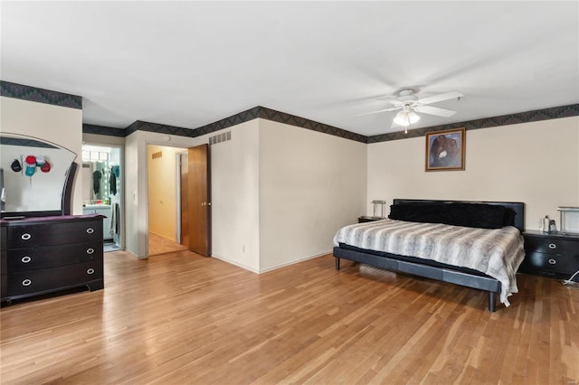 bedroom with ceiling fan and light hardwood / wood-style flooring