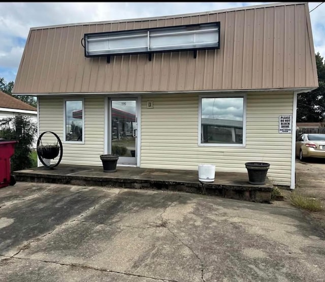 rear view of property with a patio