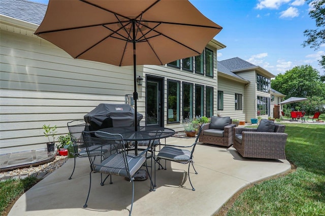 view of patio with an outdoor hangout area and a grill