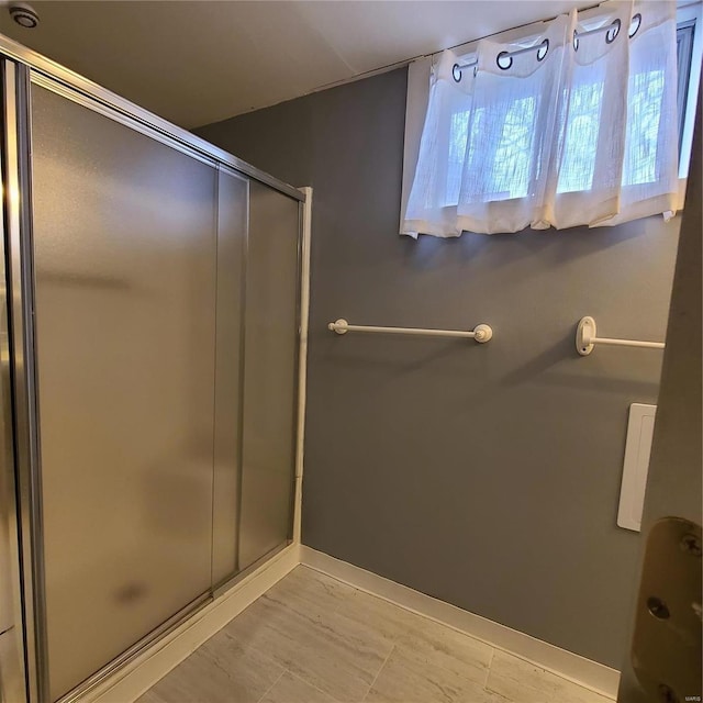 bathroom with an enclosed shower