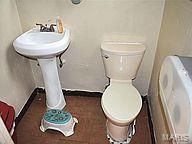 bathroom featuring toilet