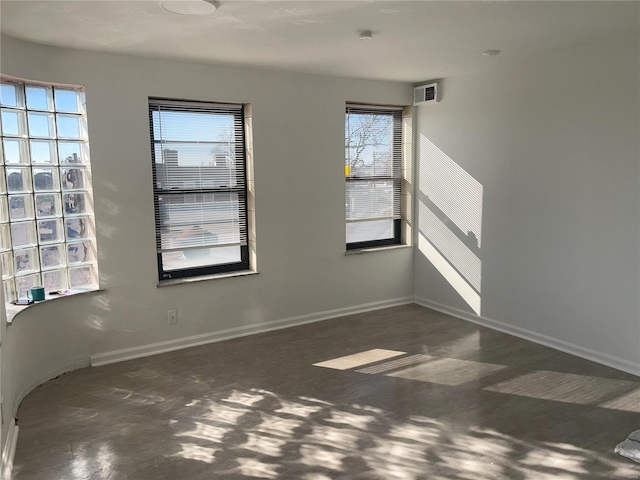 unfurnished room with a wealth of natural light