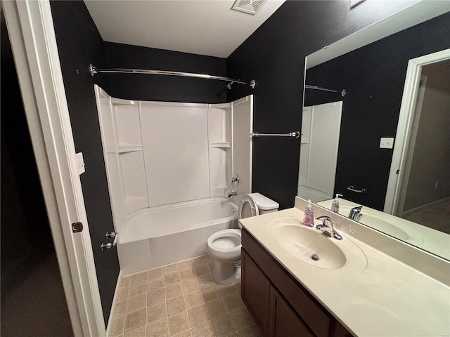 full bathroom featuring vanity, bathing tub / shower combination, and toilet