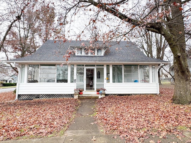 bungalow featuring a sunroom