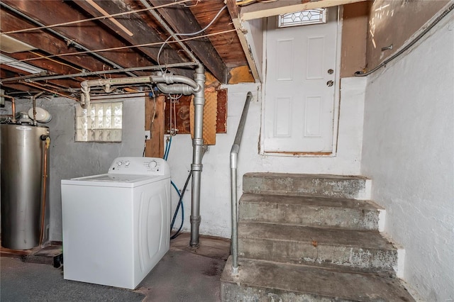 basement featuring washer / clothes dryer and water heater