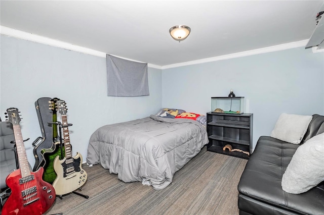 bedroom with ornamental molding