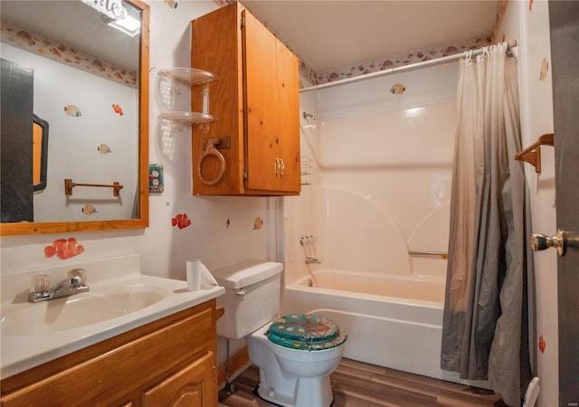 full bathroom featuring hardwood / wood-style flooring, vanity, toilet, and shower / bath combo with shower curtain