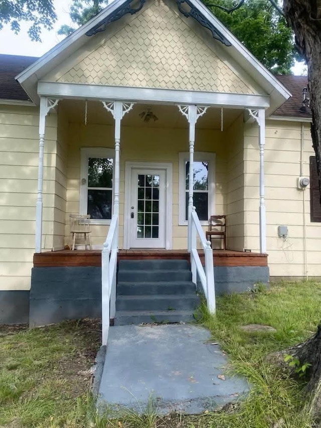 entrance to property with covered porch