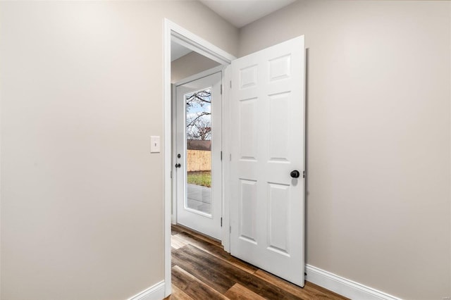 entryway featuring dark wood-type flooring