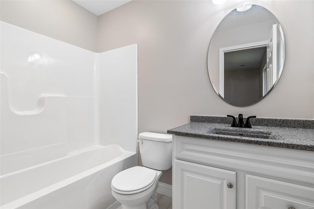 full bathroom featuring vanity, toilet, and bathing tub / shower combination