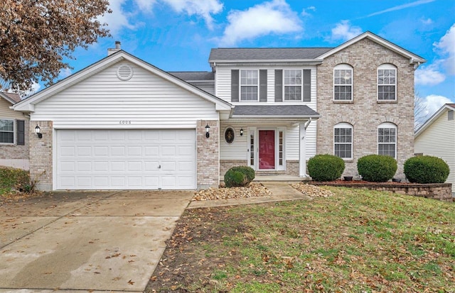 front of property featuring a garage