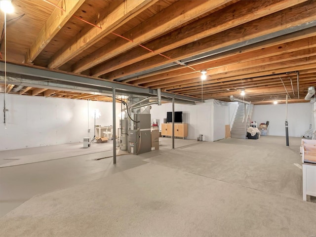 basement featuring heating unit