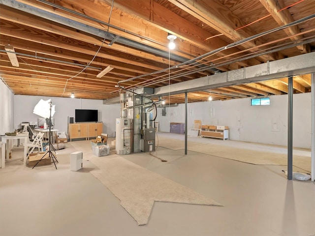 basement with heating unit and water heater