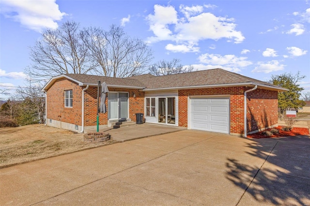 single story home with a garage