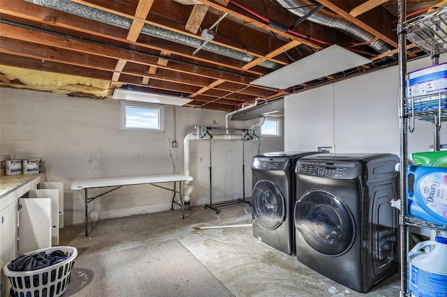 basement featuring washer and dryer